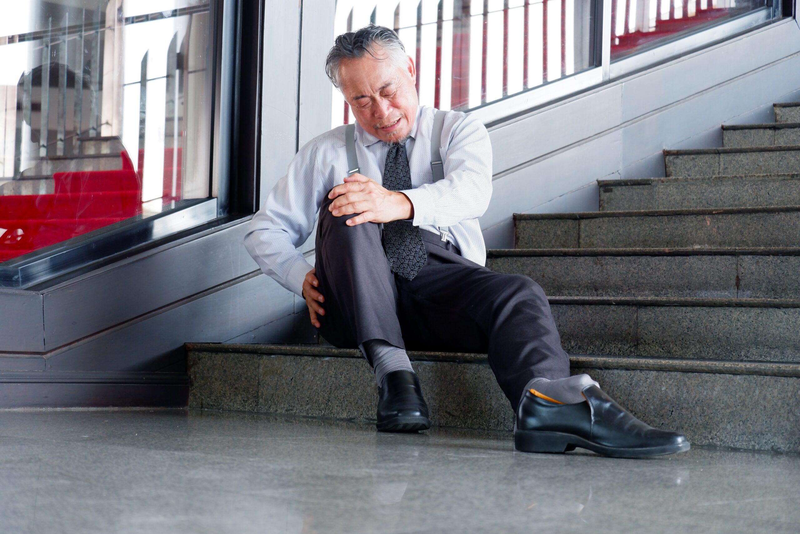 Businessman,Falls,Down,Stairs,And,Is,Injured